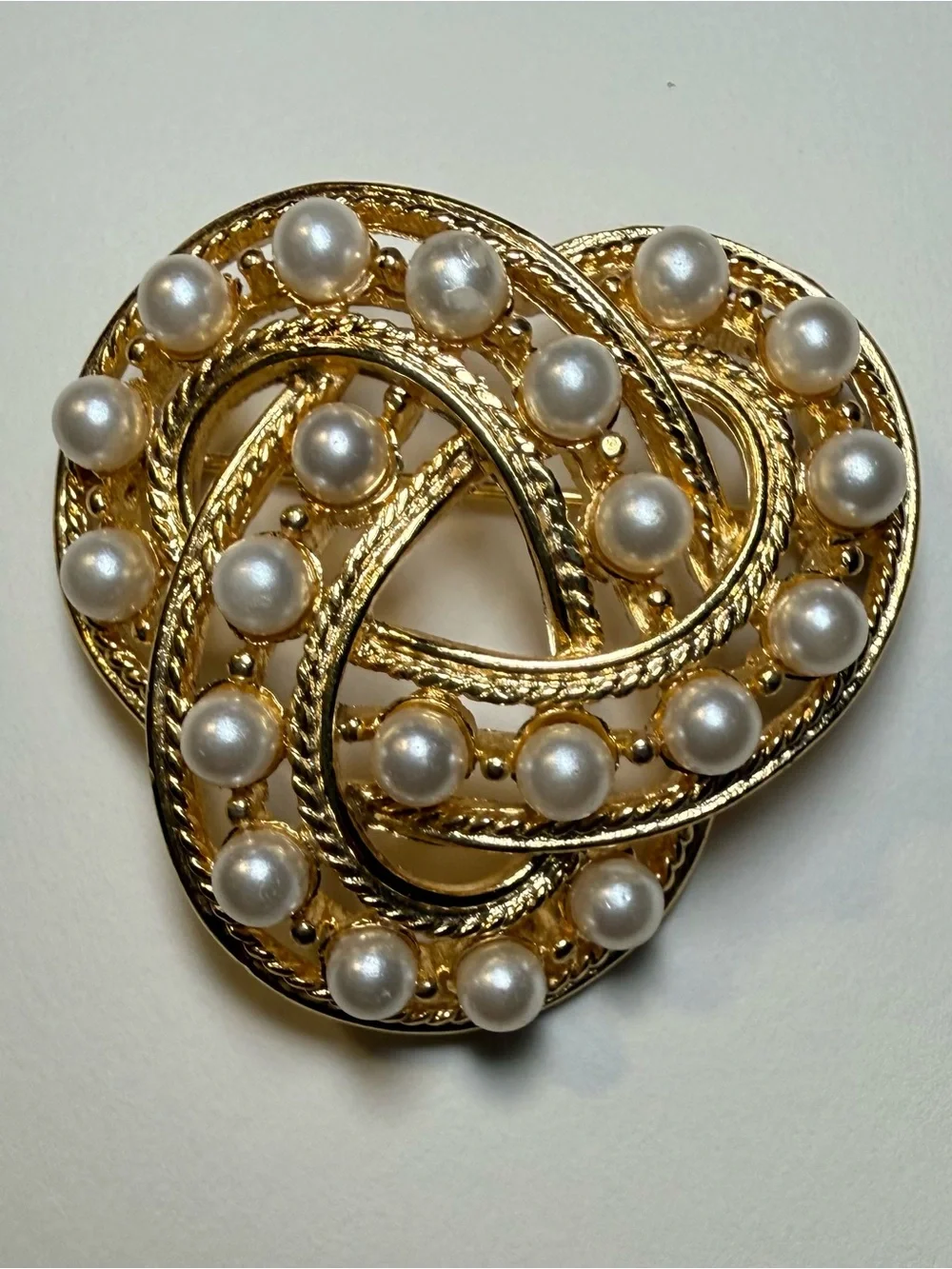 Vintage Celtic Trinity Knot Brooch. Gold plated with Faux Pearl Accents